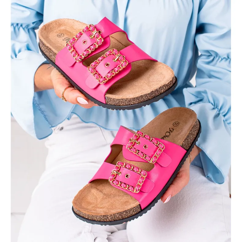 Pink slippers with decorative fasteners by SHELOVET.