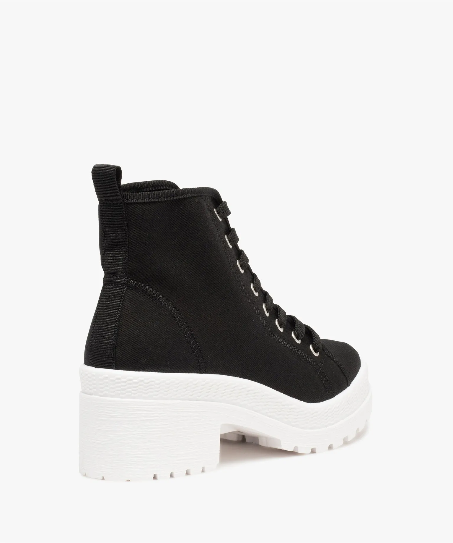 High-top black canvas tennis shoes with a solid color, heel, and grooved sole.